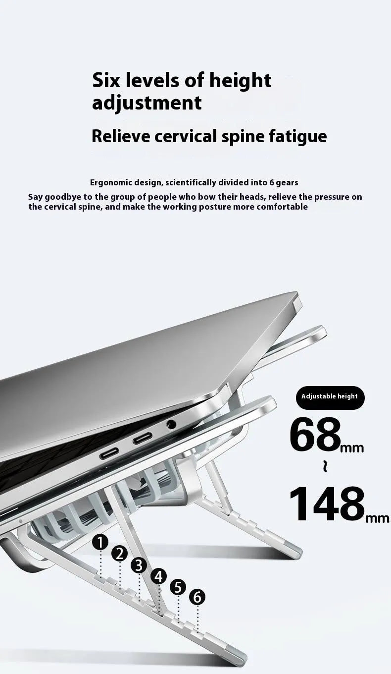Silver aluminium laptop stand with twin cooling fans in folded position beside notebook computer
