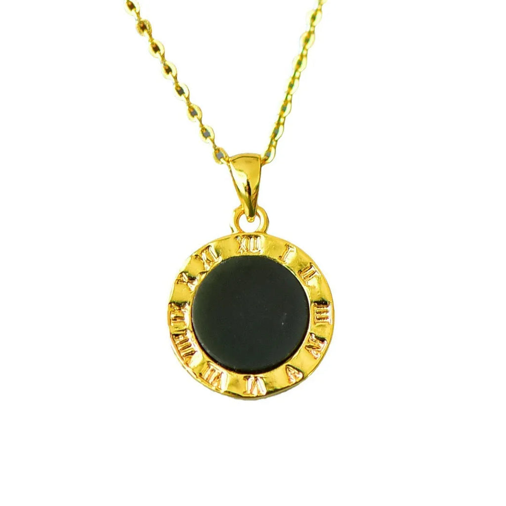 Flat Hetian gray jade pendant with copper inlay on a necklace chain.