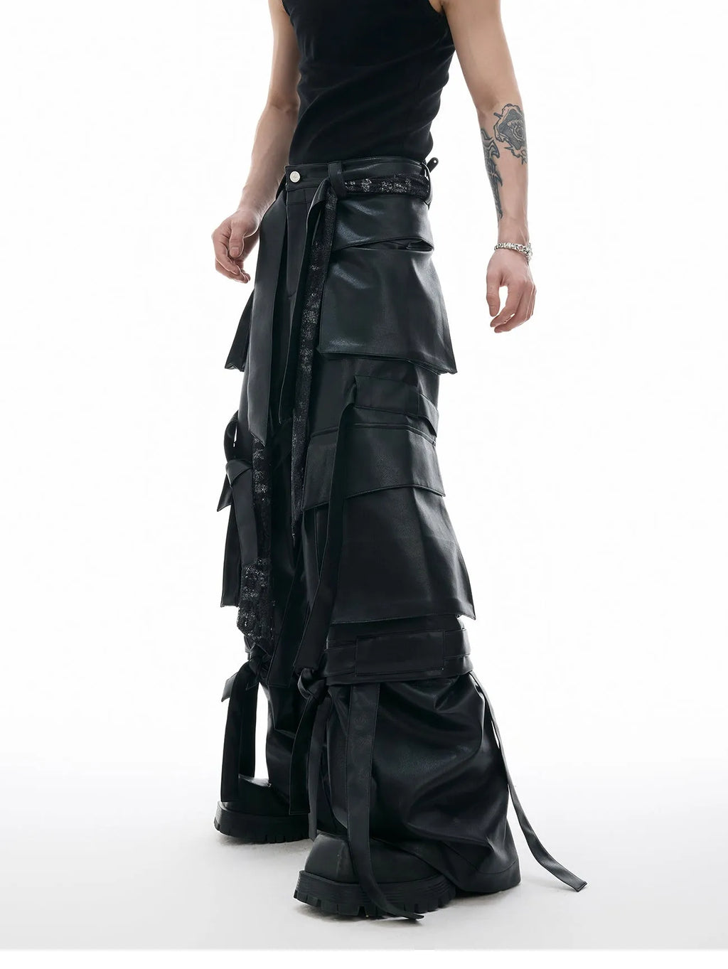 Black loose-fit retro trousers with quilted pattern and multiple stitched pockets.
