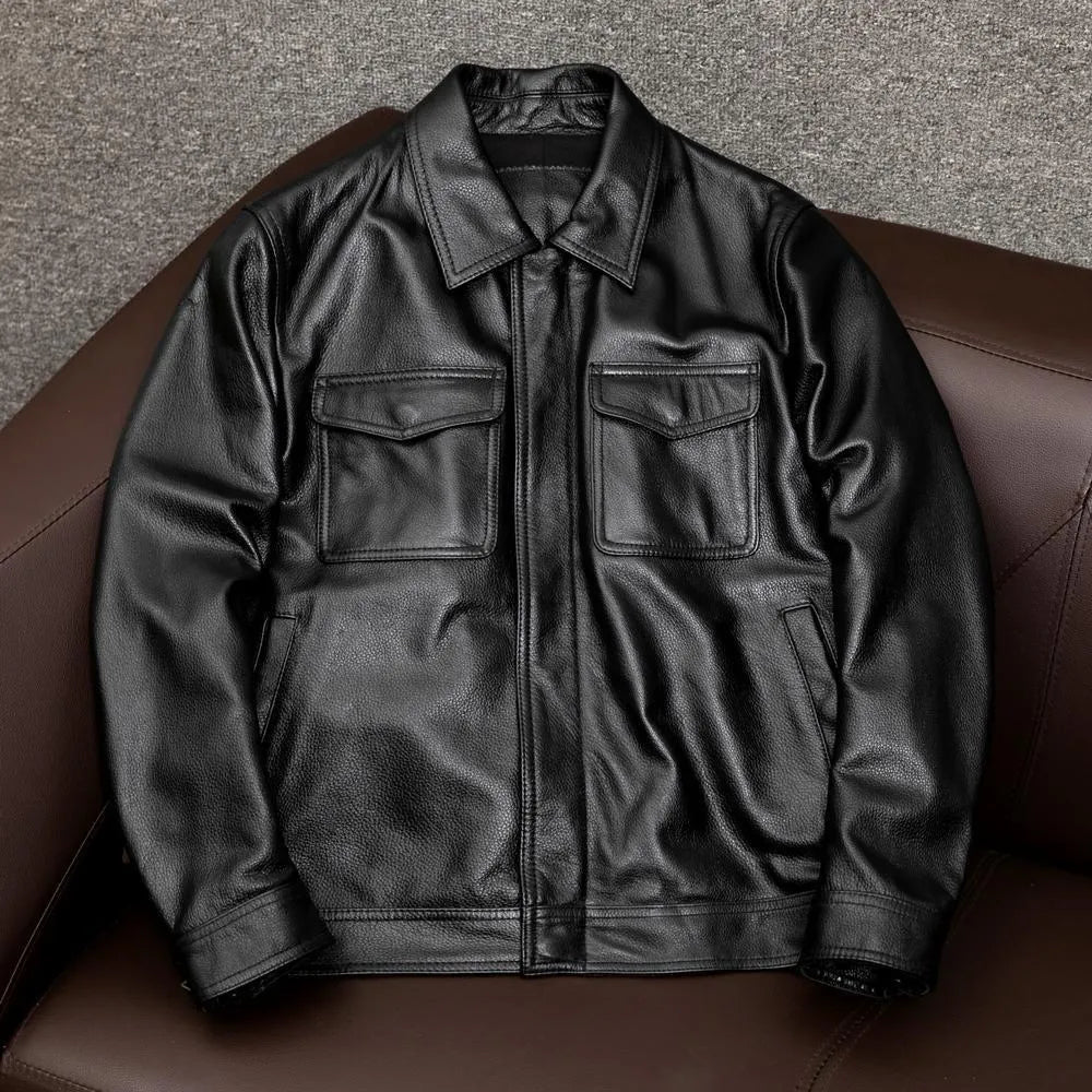 Men's black plus-size loose-fit PU leather lapel jacket with side pockets.