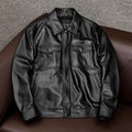 Men's black plus-size loose-fit PU leather lapel jacket with side pockets.