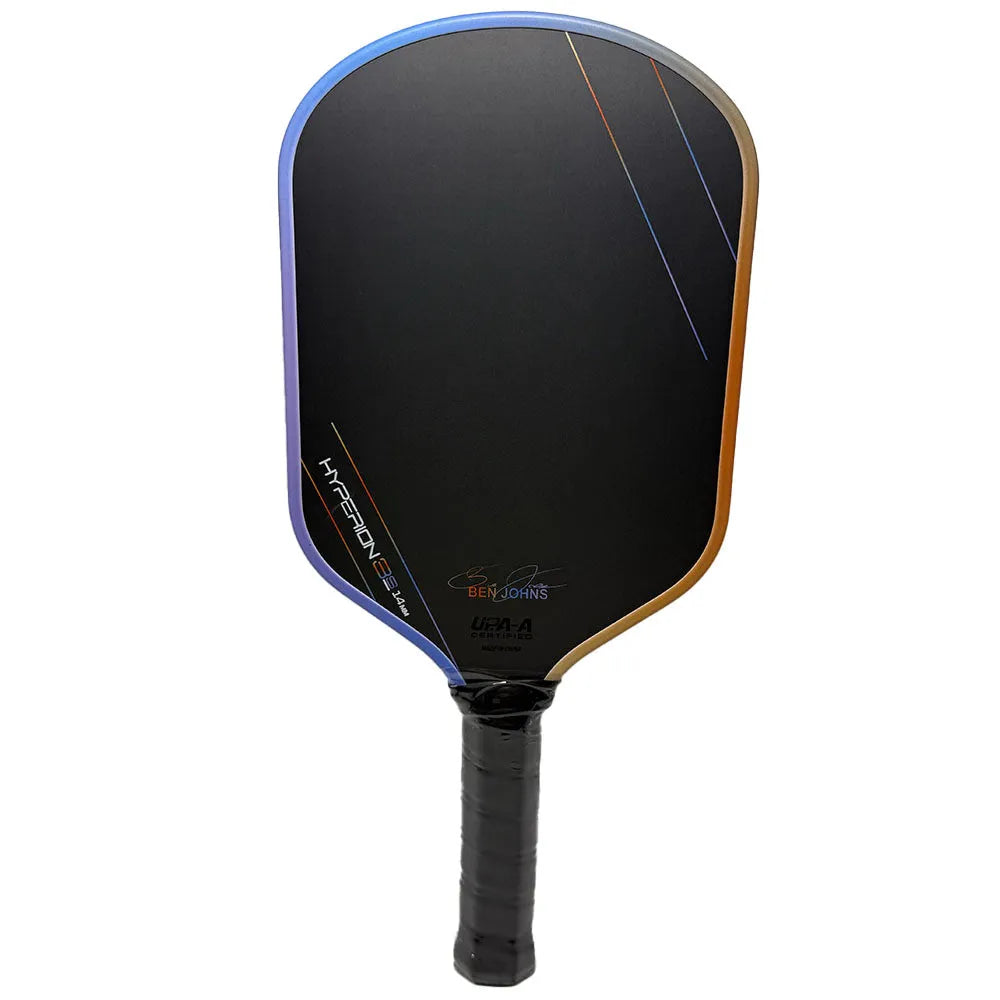 Multicolour matte-finish pickleball racket showing carbon fibre texture and honeycomb core construction.