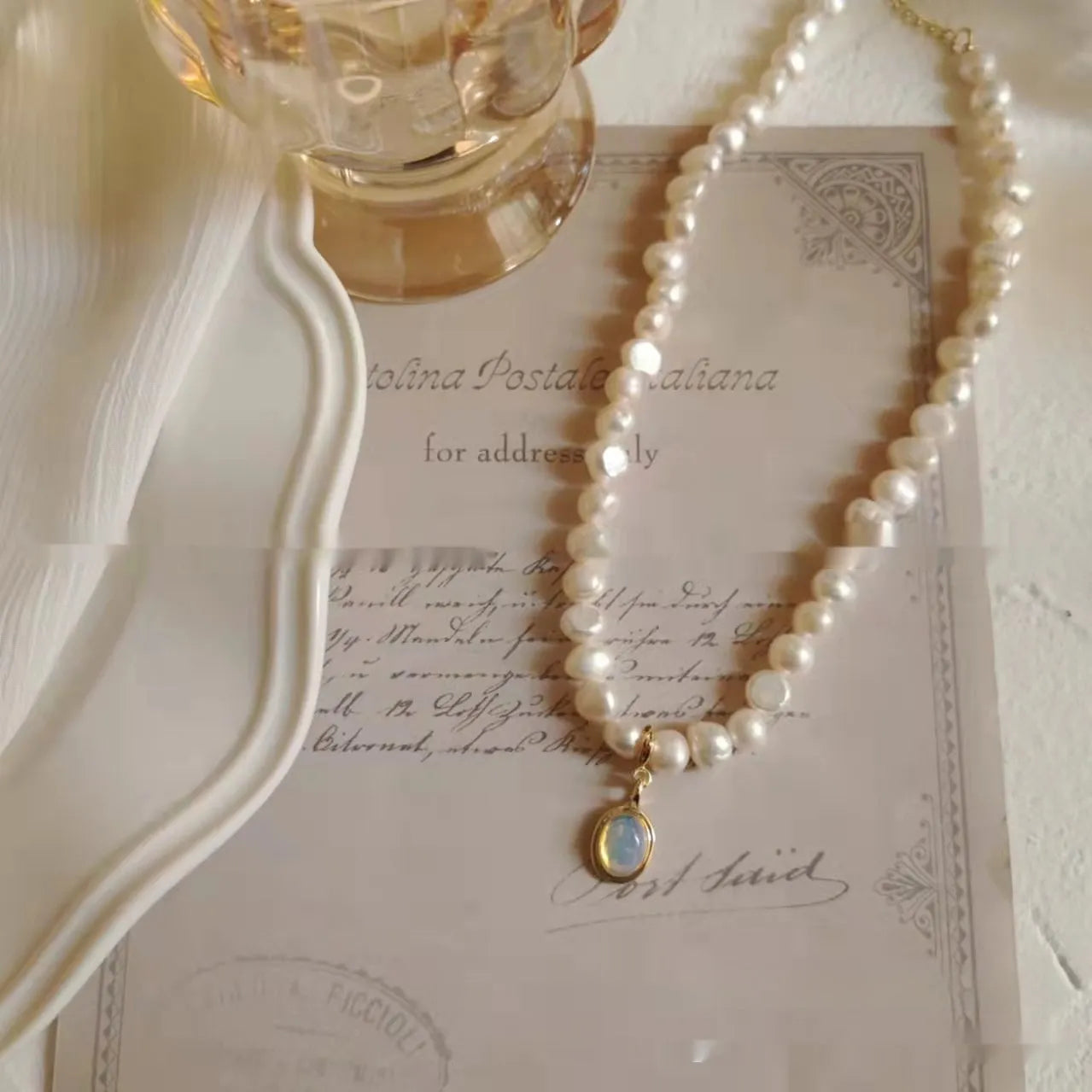 French Court vintage style pearl necklace with geometric pendant on an adjustable alloy chain.