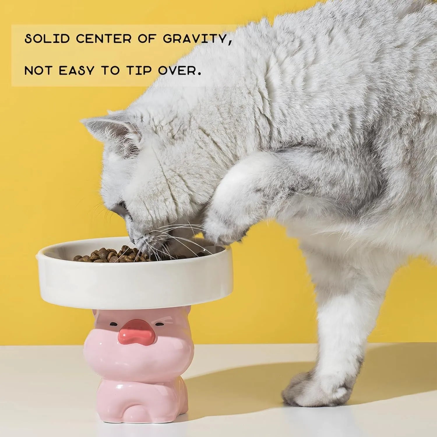 Raised ceramic cat bowl with animal design for elevated feeding
