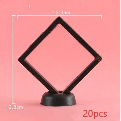 Transparent 3D floating display case holding a coin, with black and white size options