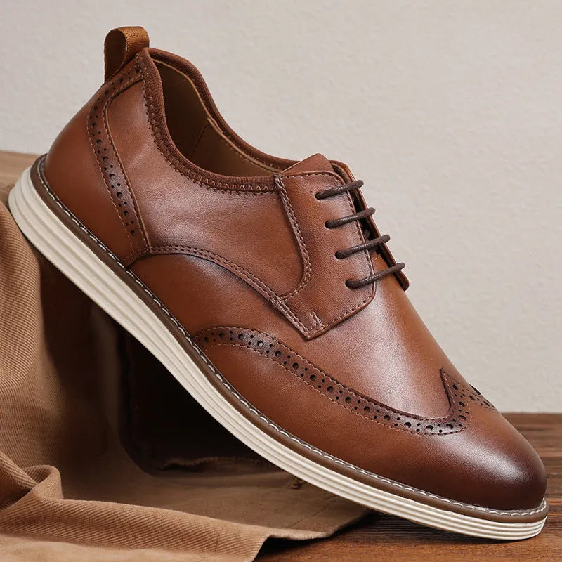 Men's black and brown slip-on business casual shoes with round toe and sculptured detailing