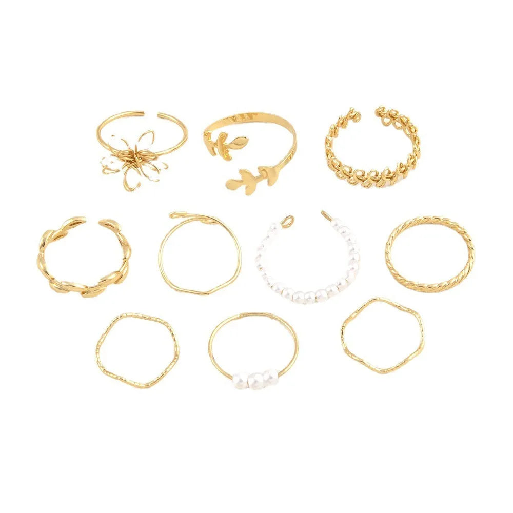 Women's gold alloy ring with openwork flower design and glossy electroplated finish