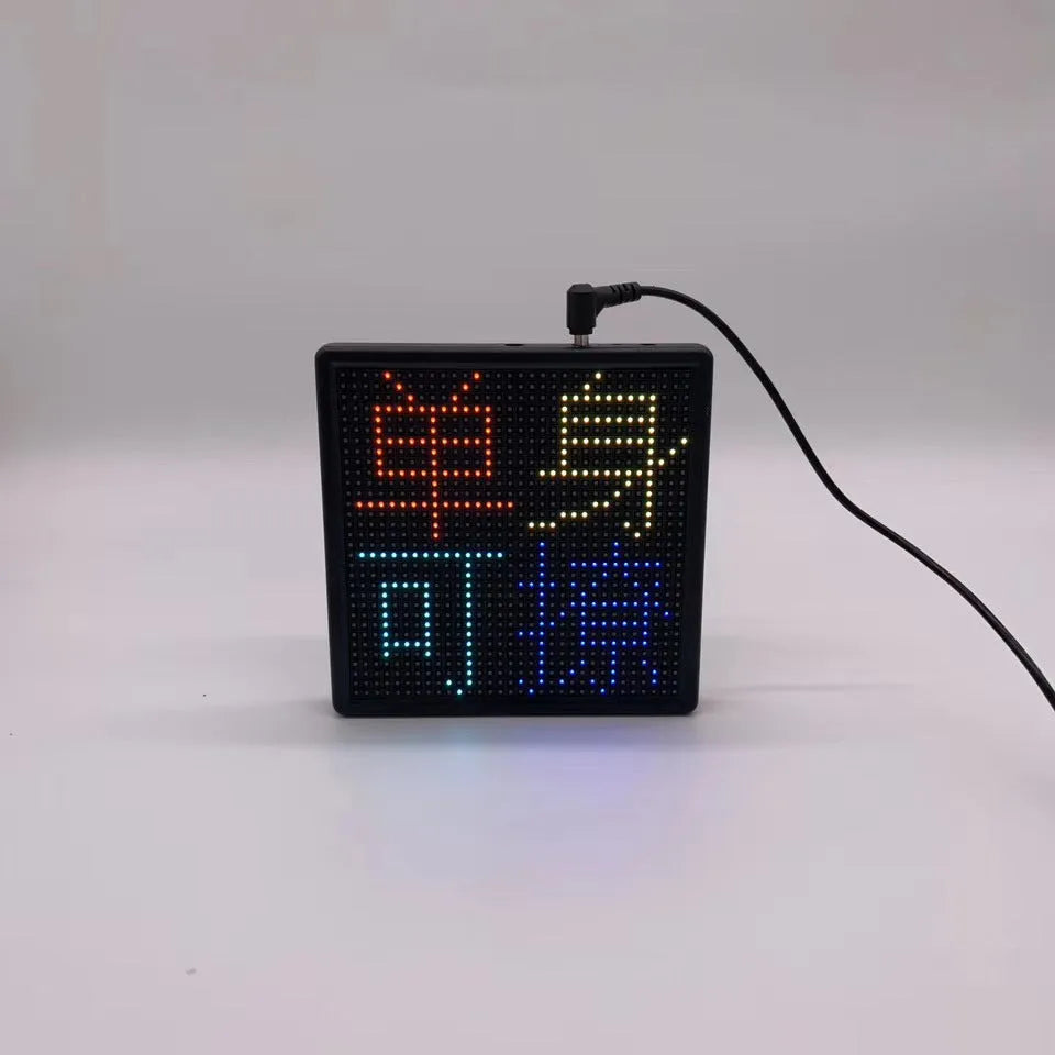 32x32 Bluetooth wireless LED car display screen with aluminium frame on a car window