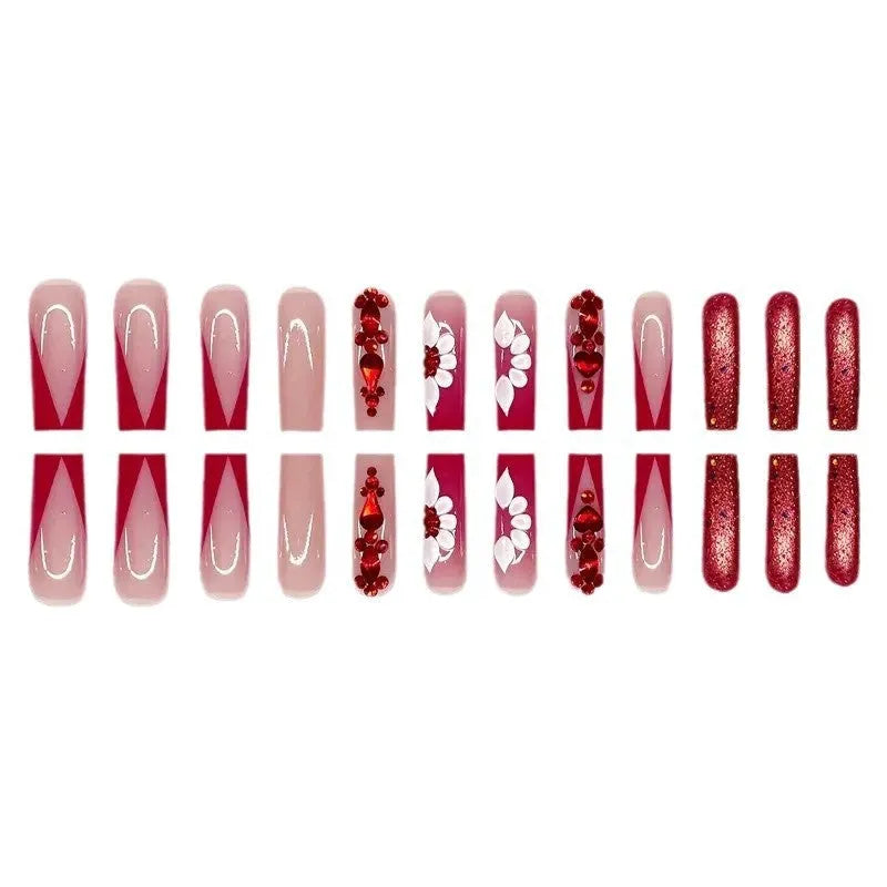 Press-on false nails with sweet floral patterns and red diamond accents in European Square long style