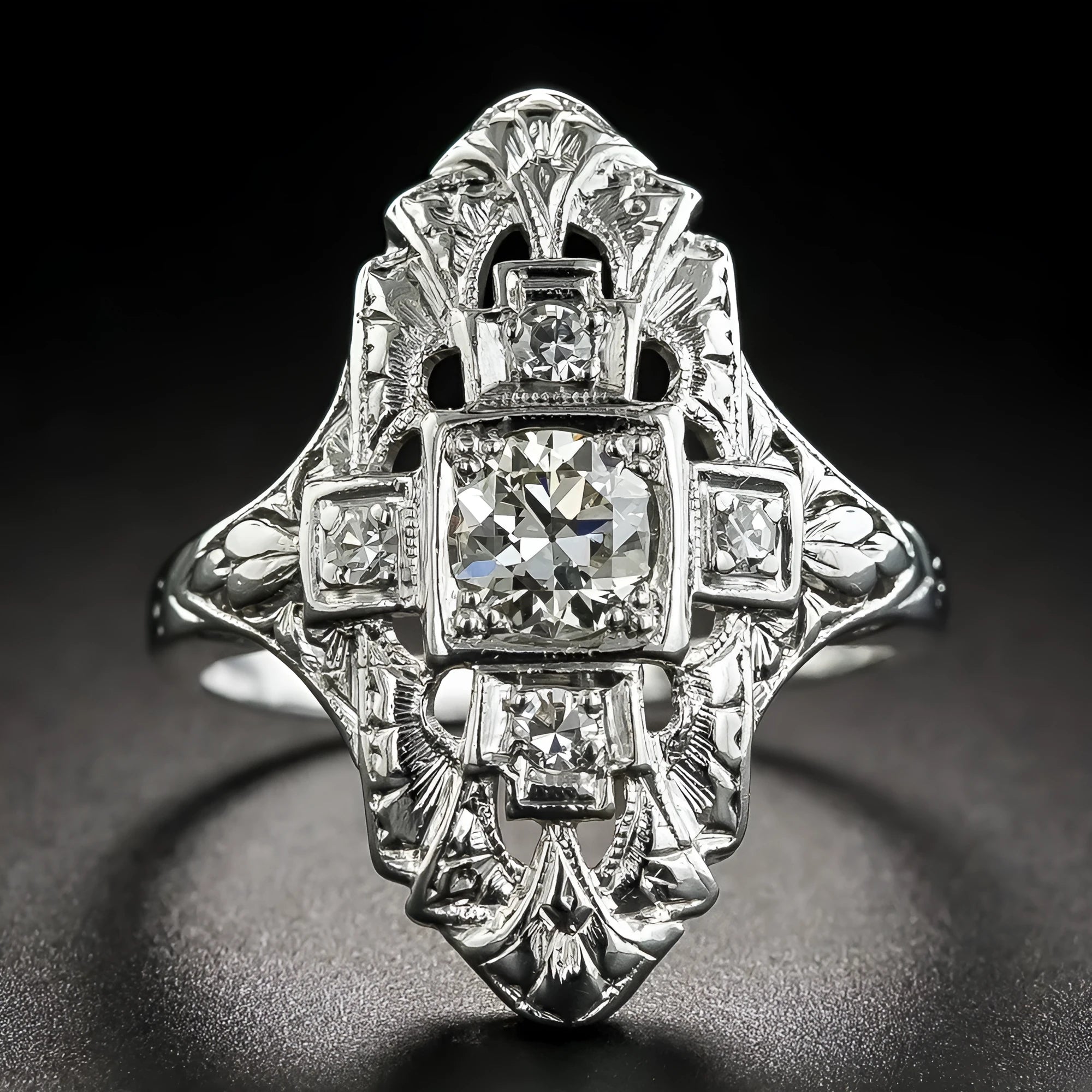 Geometric hollow out copper ring with diamond accents in electroplated silver finish