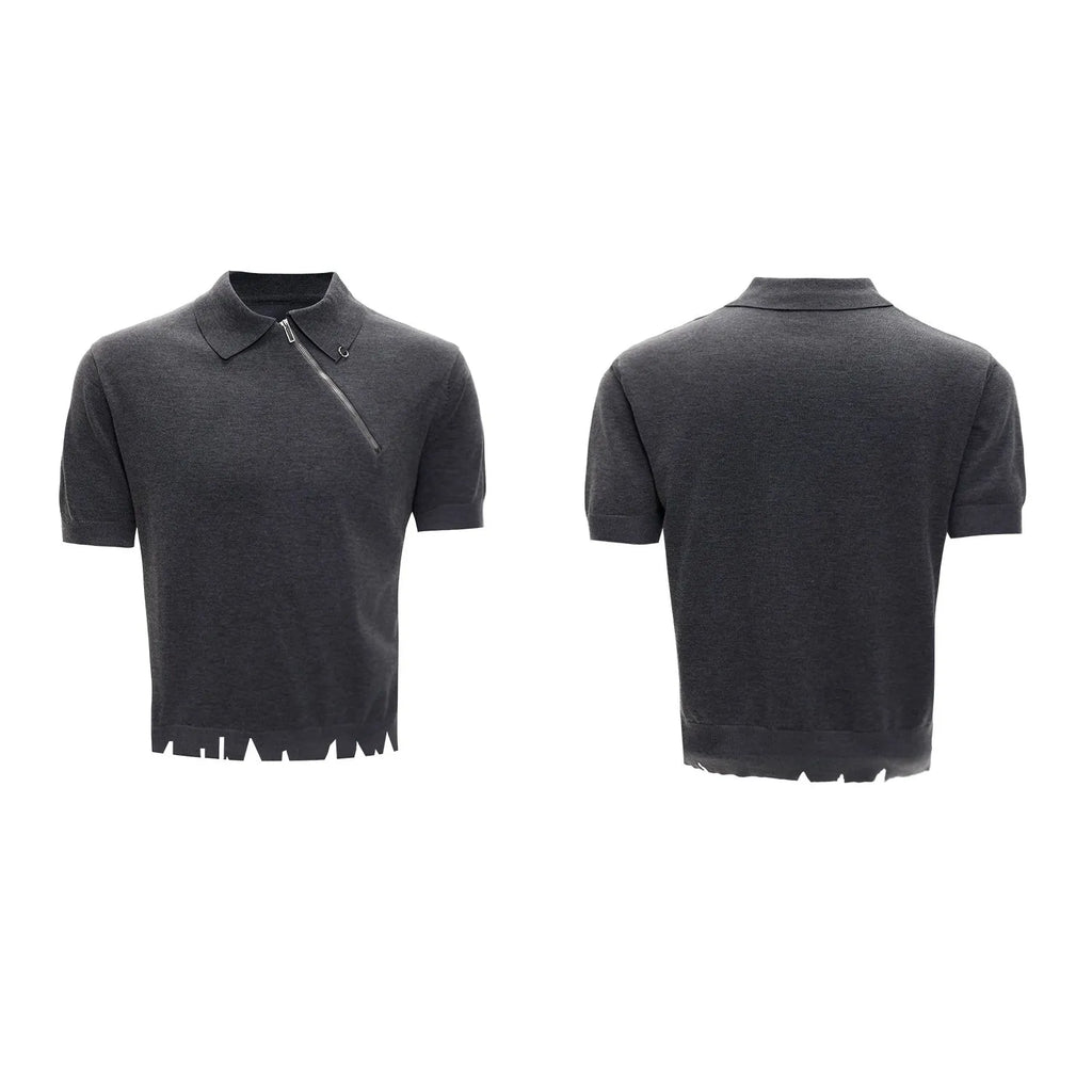 Man modelling a slim-fit black knitted polo shirt with an oblique diagonal zip closure and short sleeves.