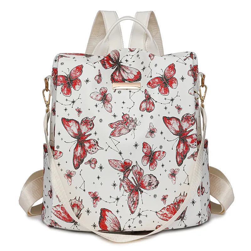 Butterfly printed PU backpack in blue with large capacity shoulder bag design and sewing line detailing