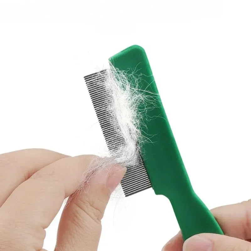 Green plastic handle flea comb with stainless steel pins for dogs and cats, shown next to a ruler indicating 129mm length.