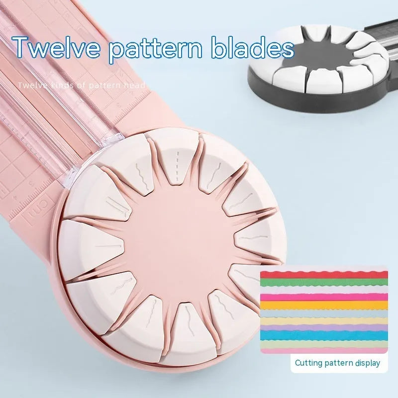 Pink plastic paper cutting machine with 12 pattern functions measuring 46.2 cm long