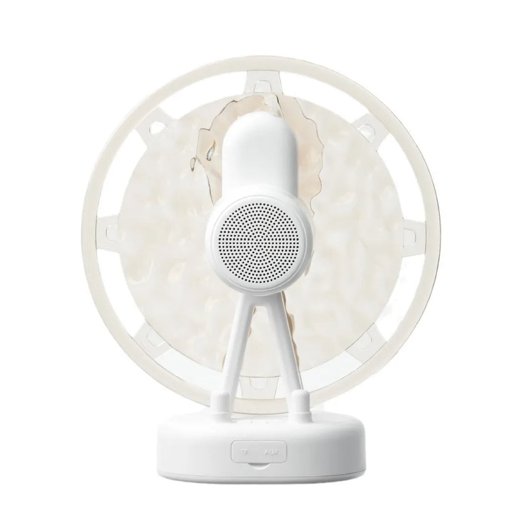 Ferris wheel water ripple Bluetooth speaker with colourful atmosphere light in pink on a white background