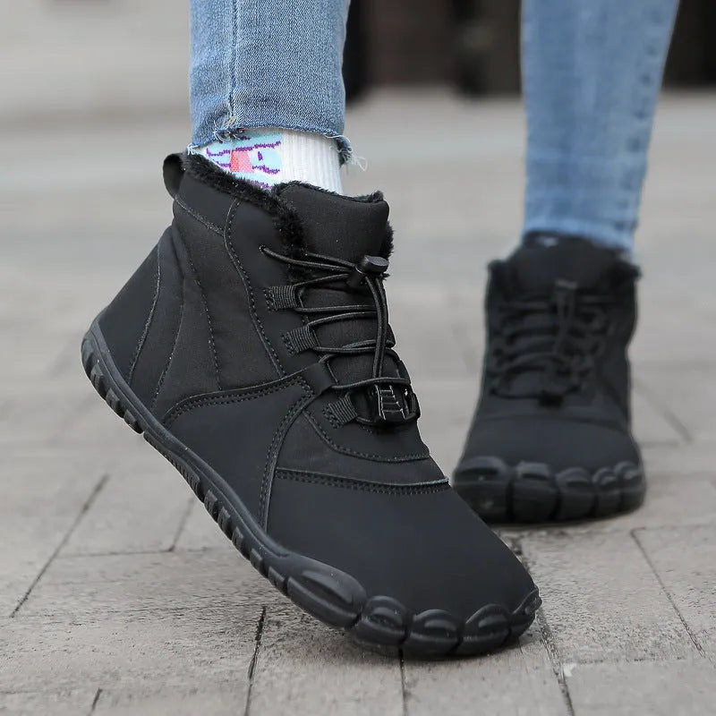 Outdoor snow boots in black with front lace-up, round toe, and a thick rubber sole.