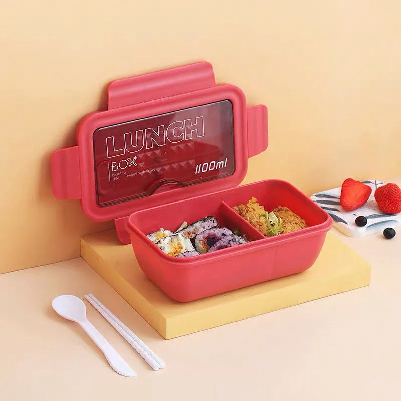Green four-layer partitioned bento lunch box with separate food compartments