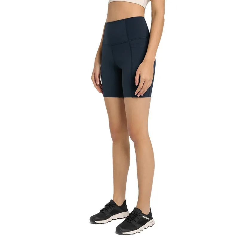 Women's black stretch cotton blend sports shorts, mid-thigh length, for running and gym workouts