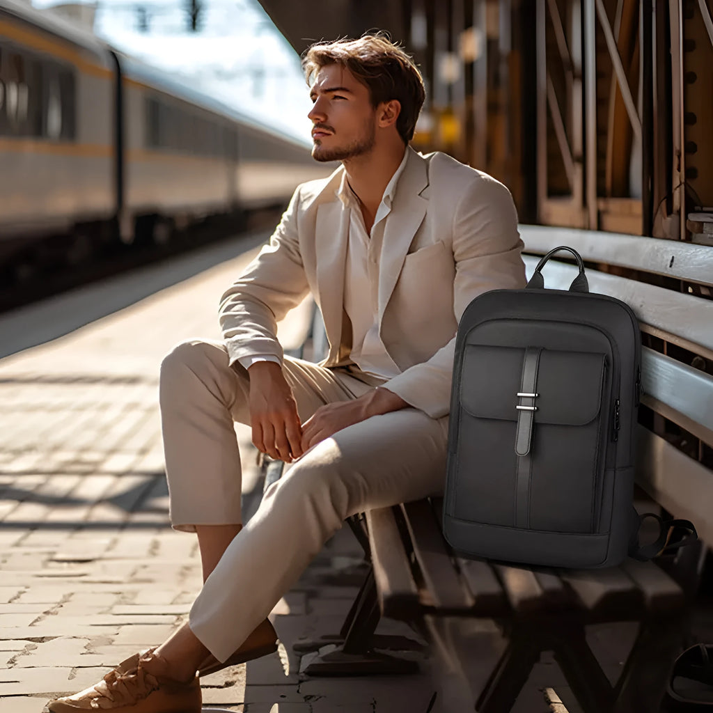 Black lightweight Oxford cloth backpack with urban simple style and polyester lining.