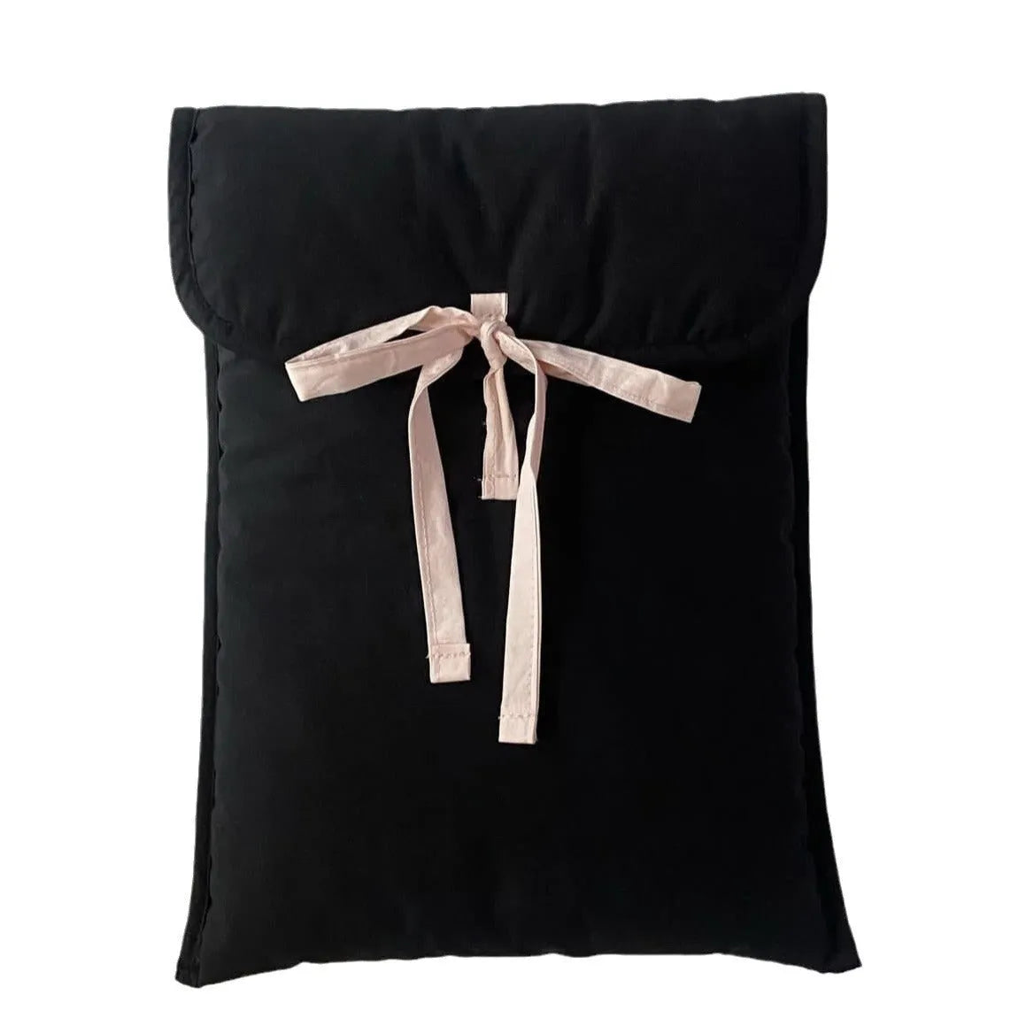 Women's black quilted computer bag with striped pattern and ballet bow detail