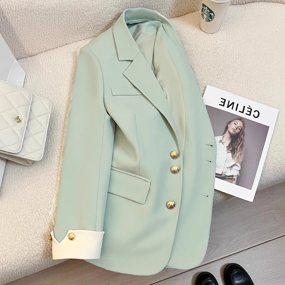 Korean style women's coat in milky white colour with loose fit and pockets