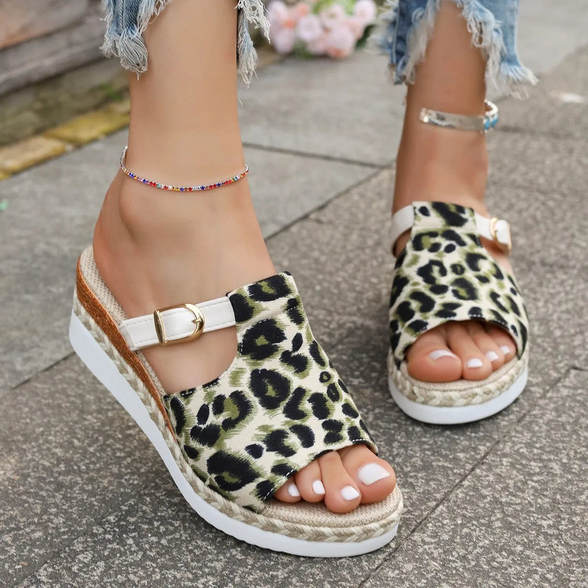 Beige leopard print wedge platform sandals with fish mouth toe opening on a white background.