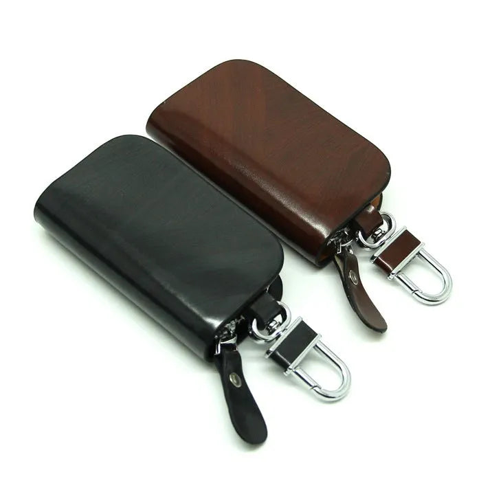 Genuine leather car key case with zipper closure and frosted finish in black or brown