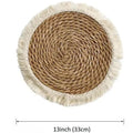 Round natural papyrus straw placemat with tassel detailing in 25cm, 30cm, 33cm, and 38cm sizes.