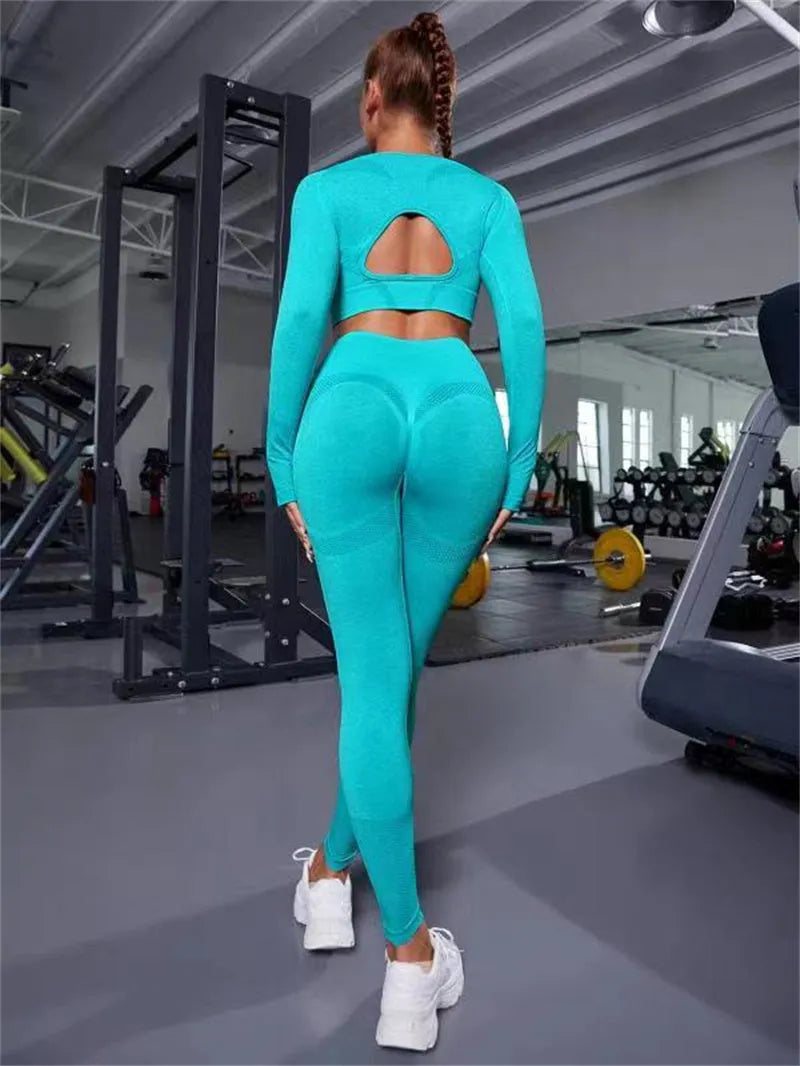 Two-piece sports suit with long sleeve hollow top and high waist seamless leggings in green