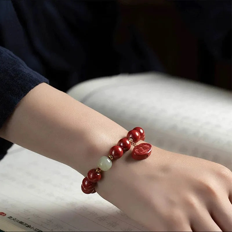 Natural cinnabar bracelet with Emperor sandstone bead in Ping An Fu Lu design, 8mm or 10mm size options