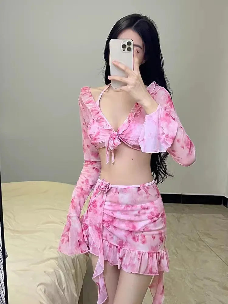 Women's floral bikini swimsuit in cherry blossom pink with adjustable straps