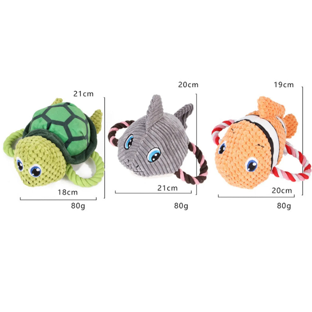 Grey turtle shaped plush dog toy with knotted rope tail and squeaker