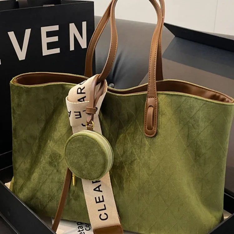 Large soft polyester shoulder bag in horizontal square shape with outer pocket, shown in light khaki colour.
