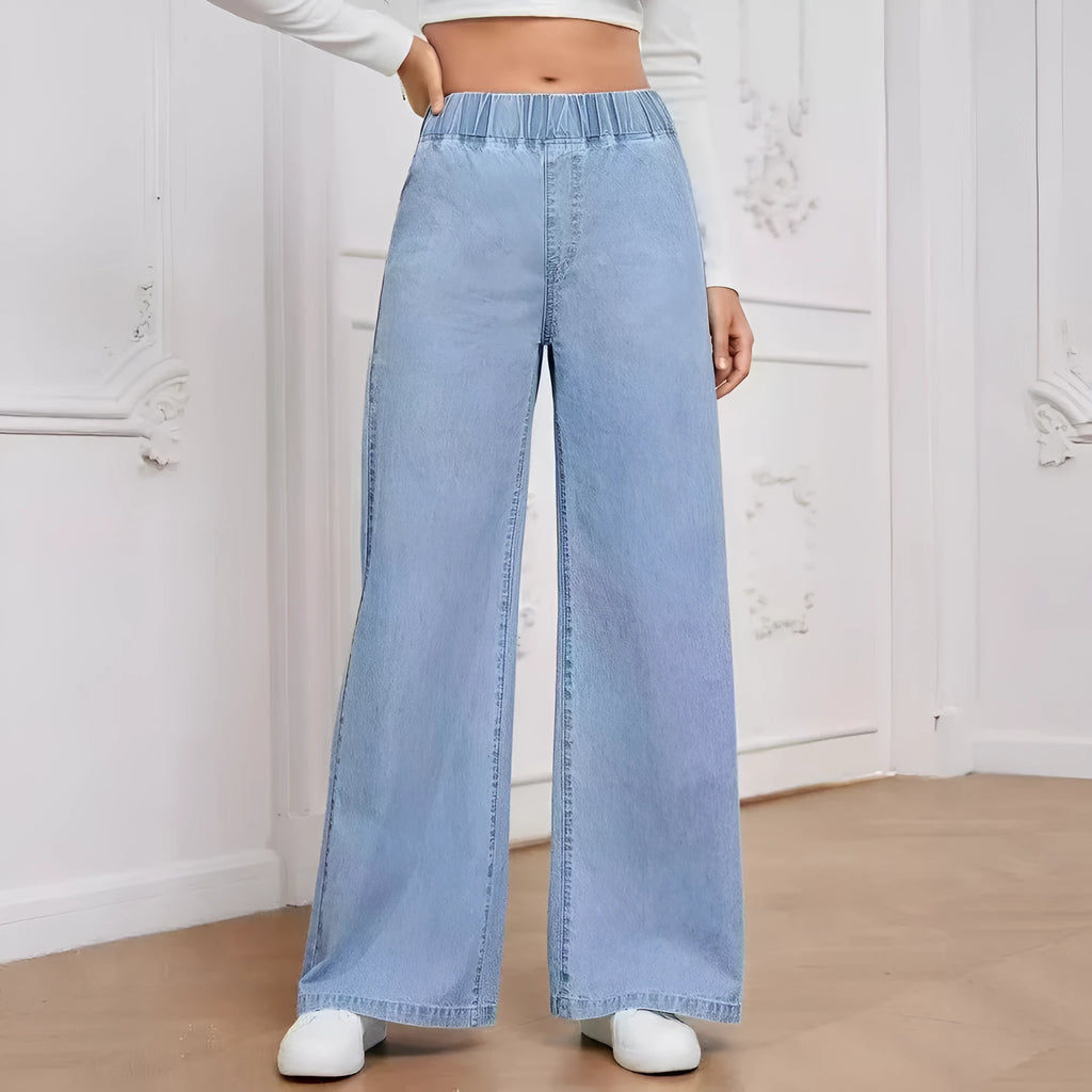 Light blue washed plus size wide-leg denim trousers laid flat showing straight leg silhouette