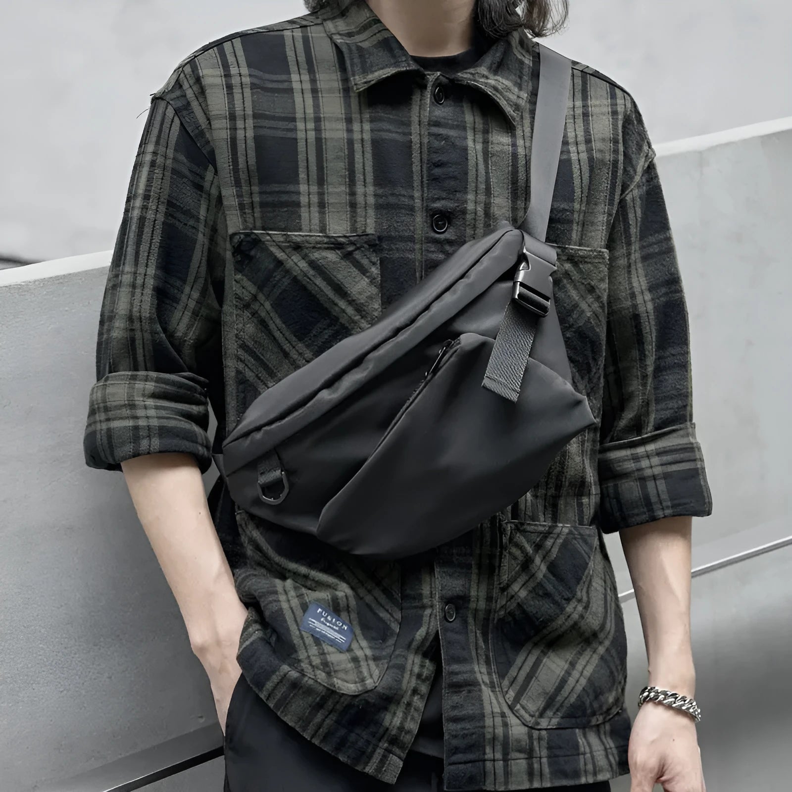 Men's black Oxford fabric slanted chest bag with sewing line detail, 8-inch size, worn across chest