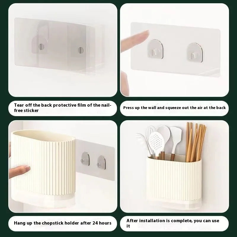 Plastic wall-mounted chopstick holder in beige with drainage holes, containing chopsticks and spoon