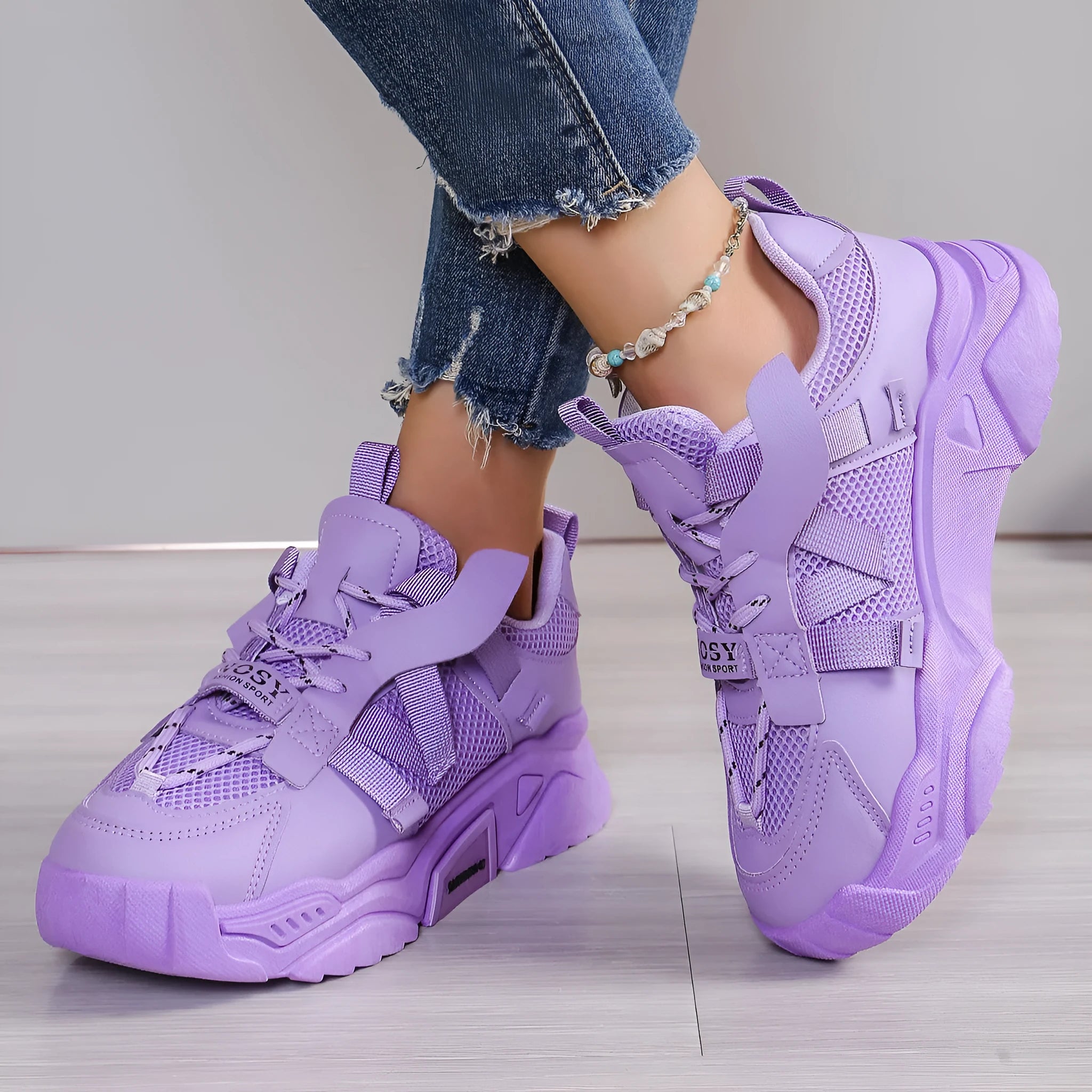 Women's purple platform mesh sports shoes with lace-up front and patterned sole