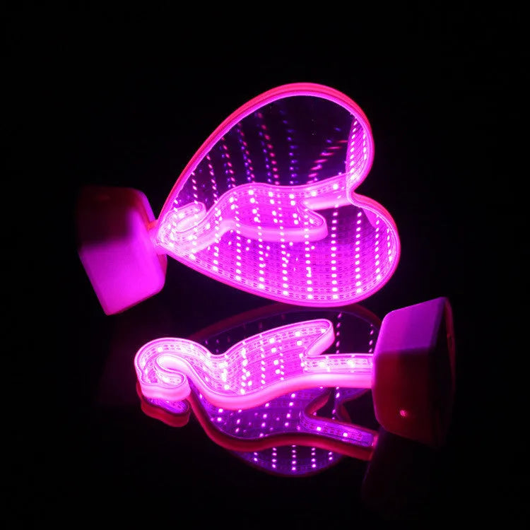 Rose red double-sided love tunnel shaped LED decorative light on a table