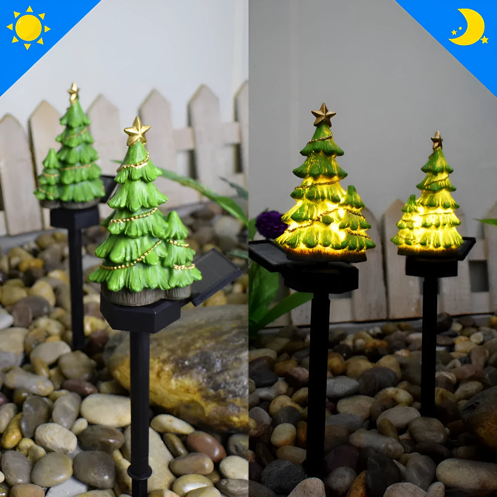 Solar Christmas tree ground plug light with resin body, warm white LED, and 40x40mm solar panel on a lawn