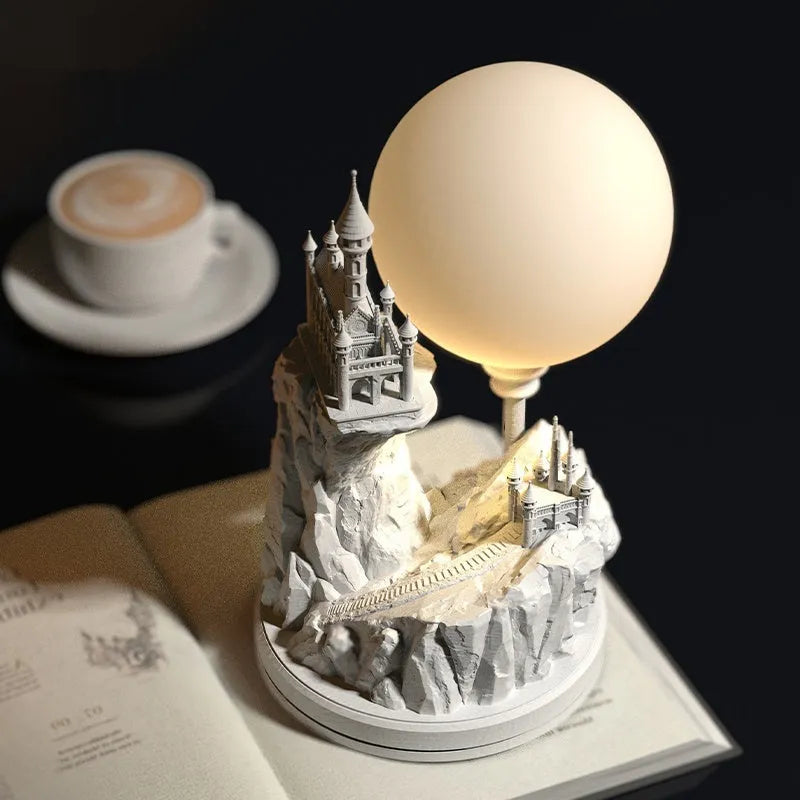 White composite gypsum table lamp with wire switch on cord.