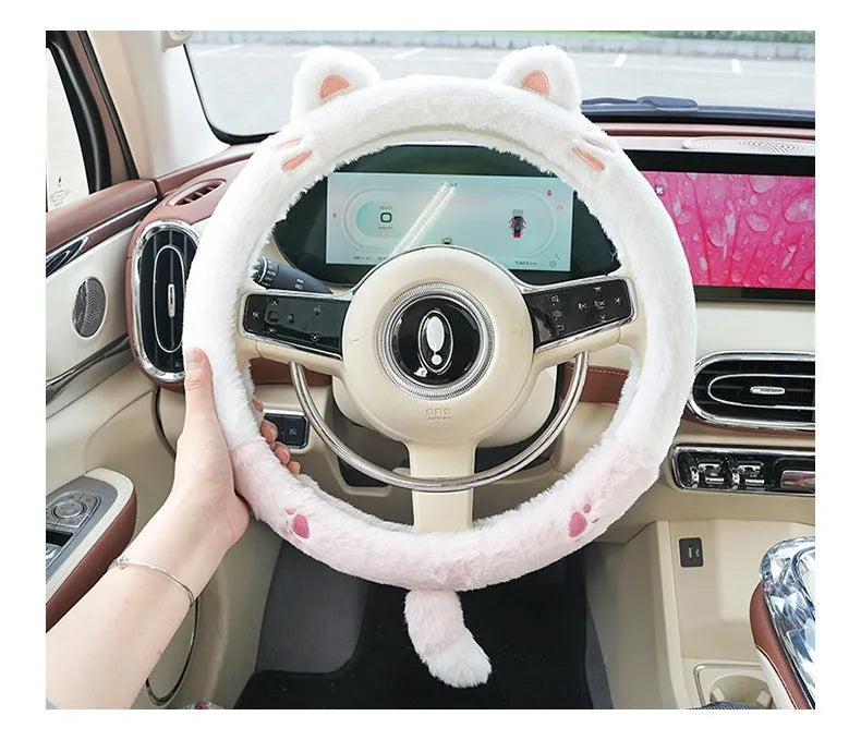 Plush winter car steering wheel cover with embroidered bear motif, designed for 38cm diameter wheels.