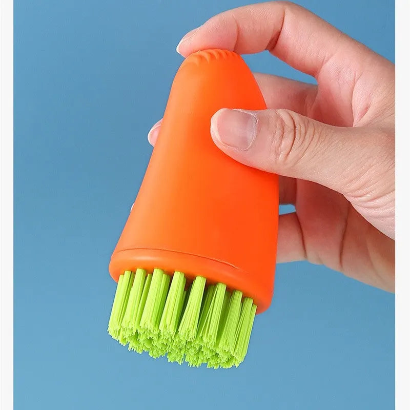 Multifunctional carrot-shaped kitchen brush with nylon bristles in orange and white colours