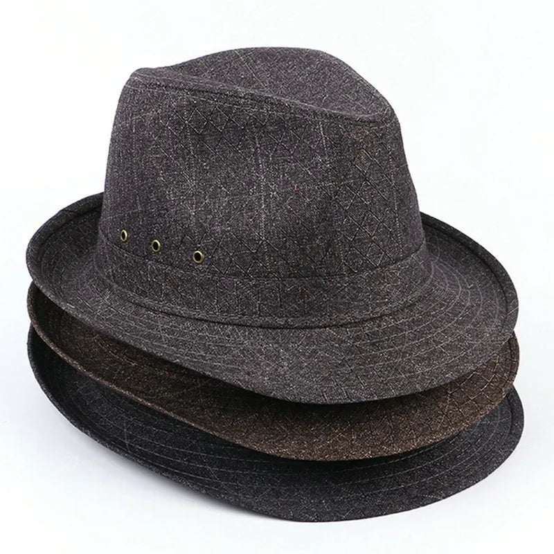 A men's brown fedora hat made from thickened suit material on a grey background.