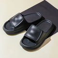Thick-soled EVA foam flip-flop slippers for men and women in assorted colours on a white background.