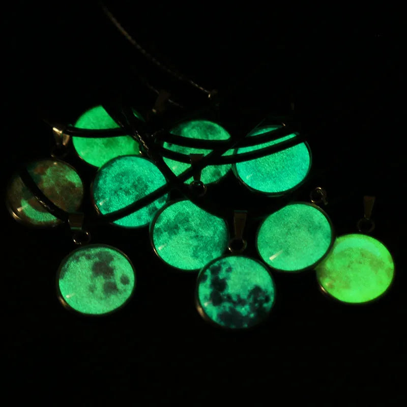 Constellation night sky pendant necklace with luminous alloy and organic glass on an adjustable chain.