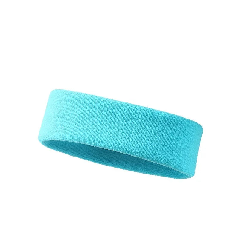 Elastic solid colour sports sweatband in black, shown on a white background.