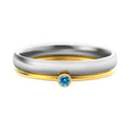 December birthstone engraved ring in titanium steel with gold accents and a geometry shape.