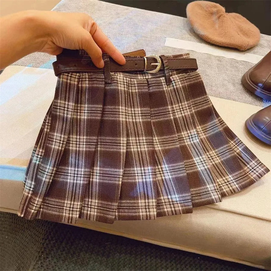Girls' plaid pleated skirt in cotton blend fabric shown in A-line style for casual wear