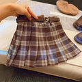 Girls' plaid pleated skirt in cotton blend fabric shown in A-line style for casual wear