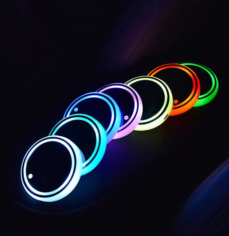 68mm LED cup holder coaster with 7-colour RGB lighting for cars, showing non-slip acrylic surface and USB charging port